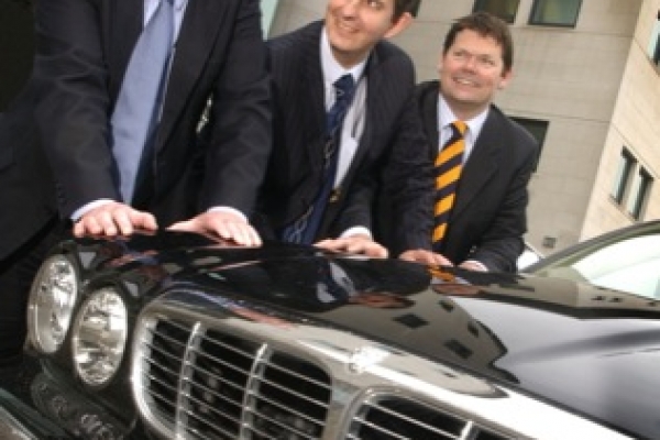 The Honorary Consul to the Netherlands, Caron Mc Mullan, fits Dutch number plates to his car to promote the launch of NI-NL, during the Dutch Society's Queens Day celebrations.  